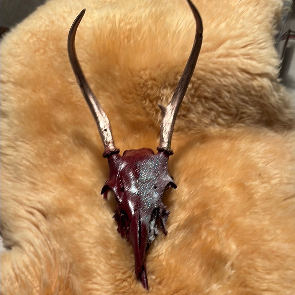 Deep Red Deer Skull, gold antlers aero decent white glitter.